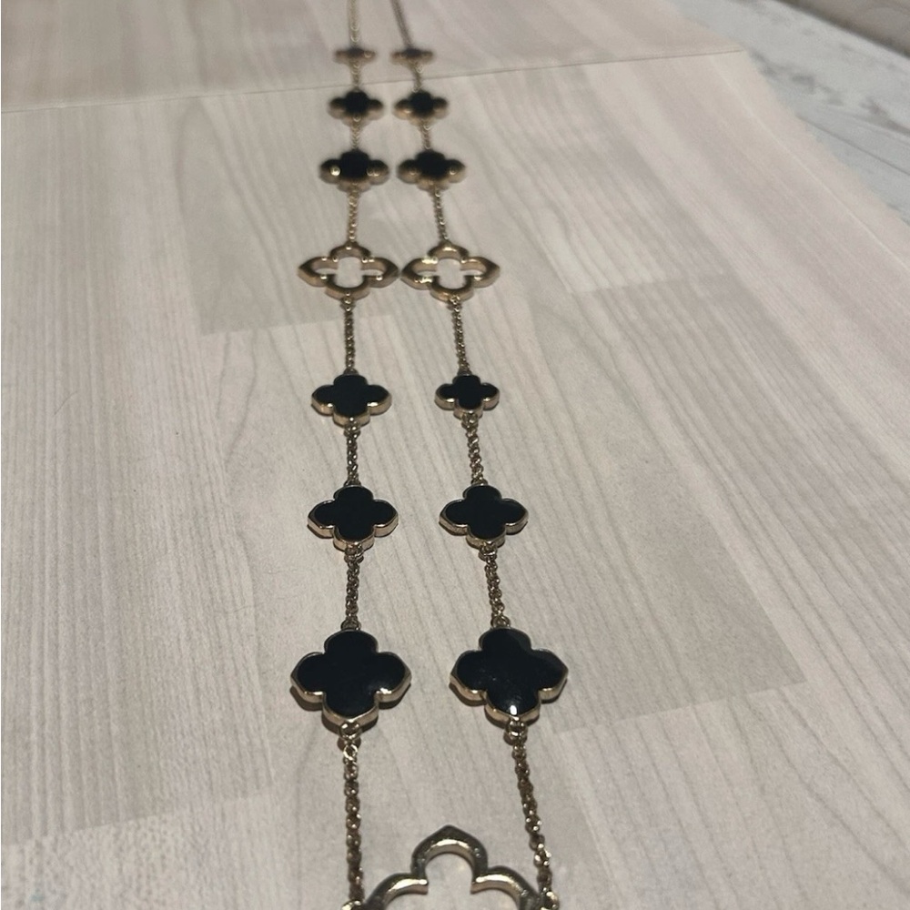 Elegant Black and Gold Clover Necklace